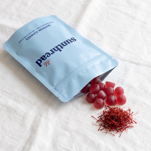 Open Sunthread pouch with berry saffron gummies and saffron threads